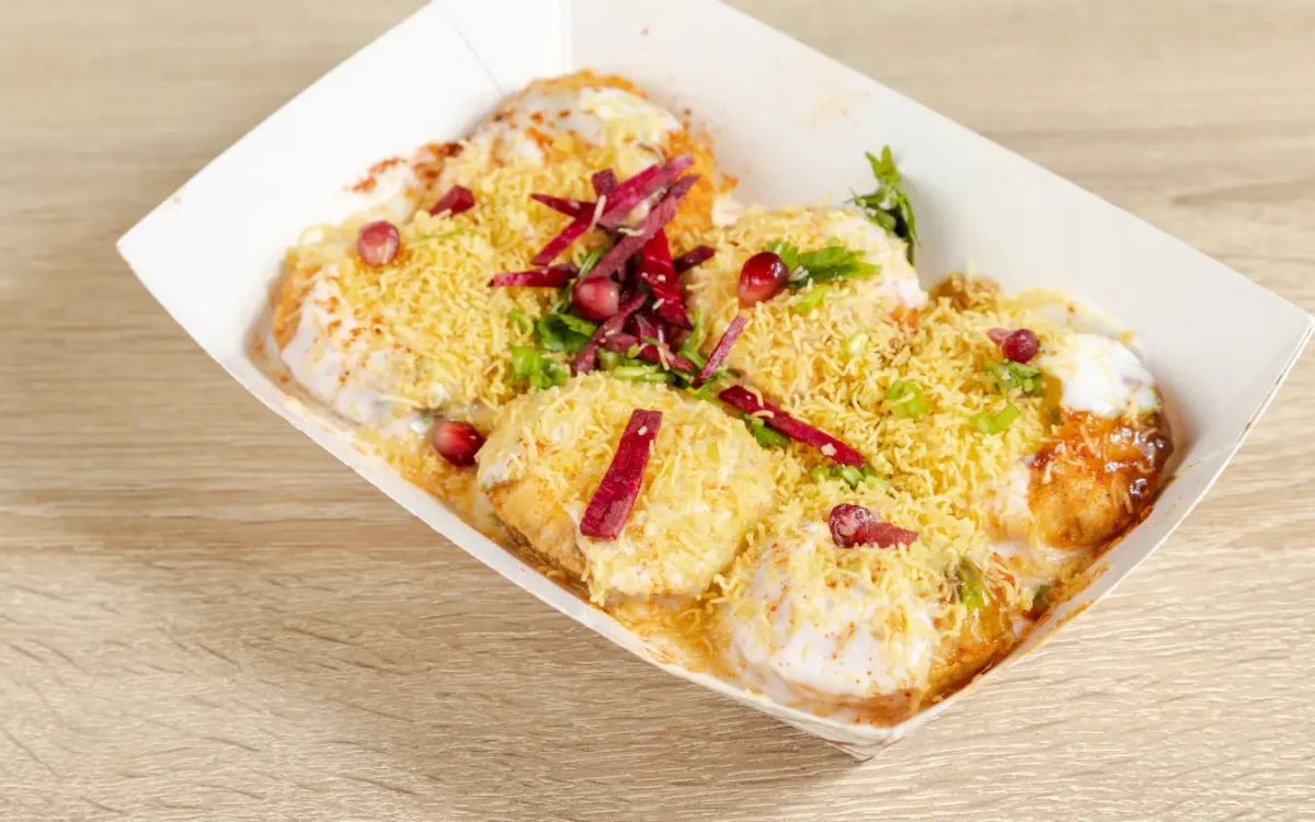 Fresh dhania coriander on desi Indian dahipuri chaat in Brampton